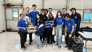 A picture of a group of students from the Robotics Club